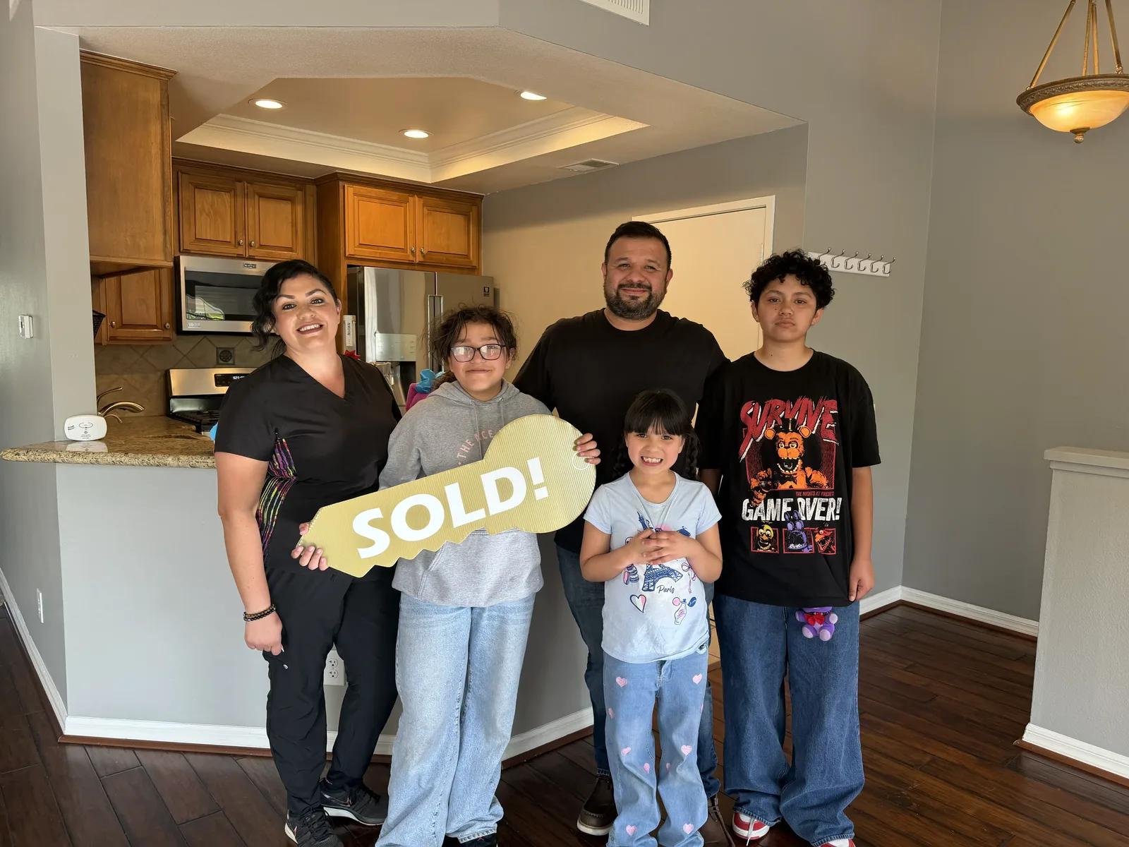 Mirna & Carlos with Edgar Limon at their new home
