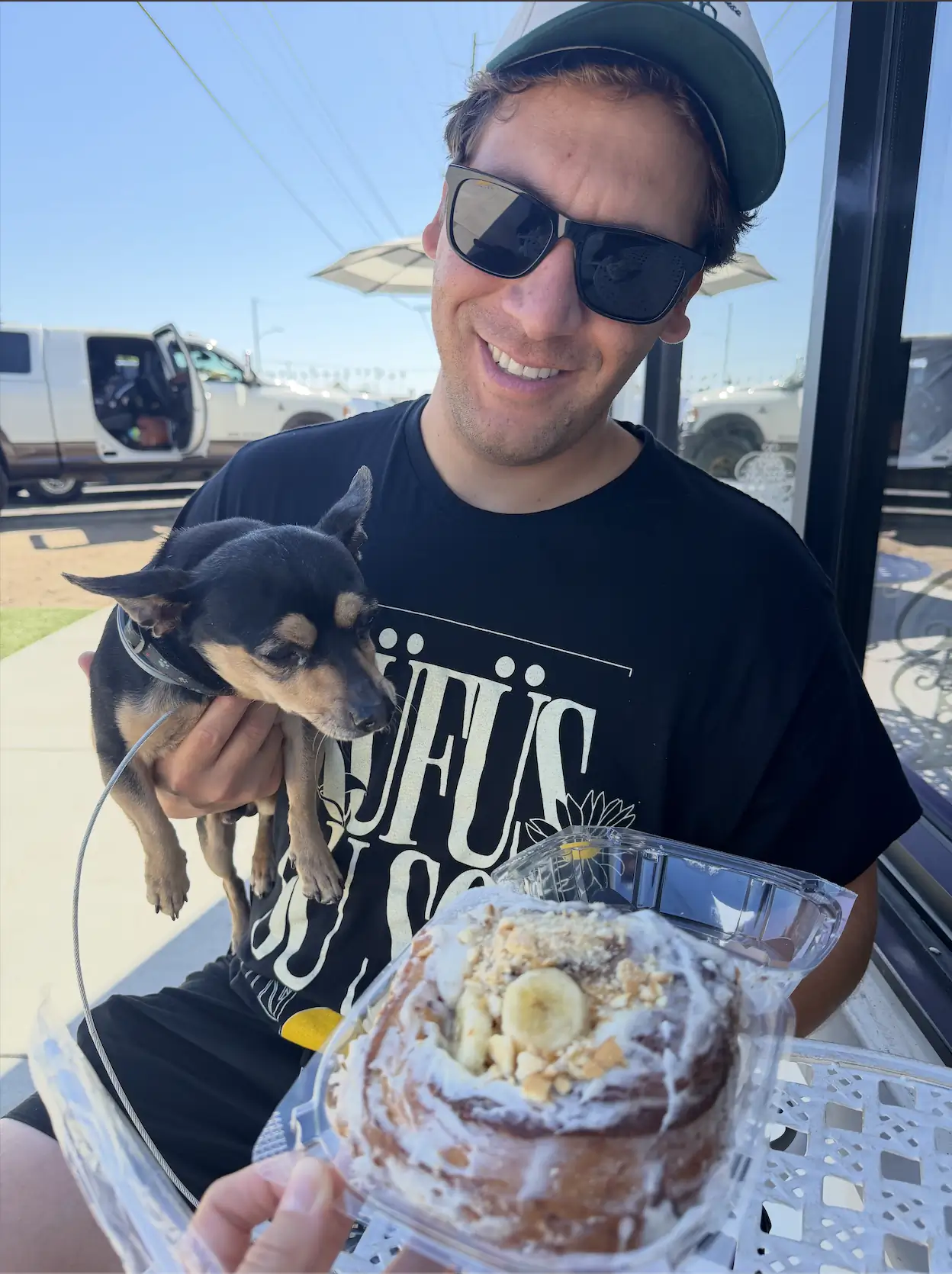 Oralia's Bakery in Oxnard: Go Early, They Sell Out Edgar Limon and his dog Dino with a frosted banana pastry outside Oralia's Bakery in Oxnard